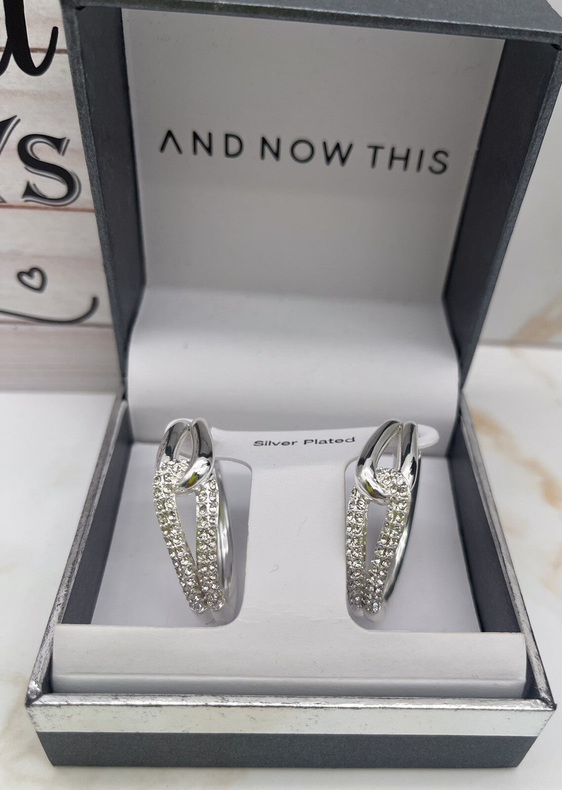 And Now This Silver Plated Women’s Hoop