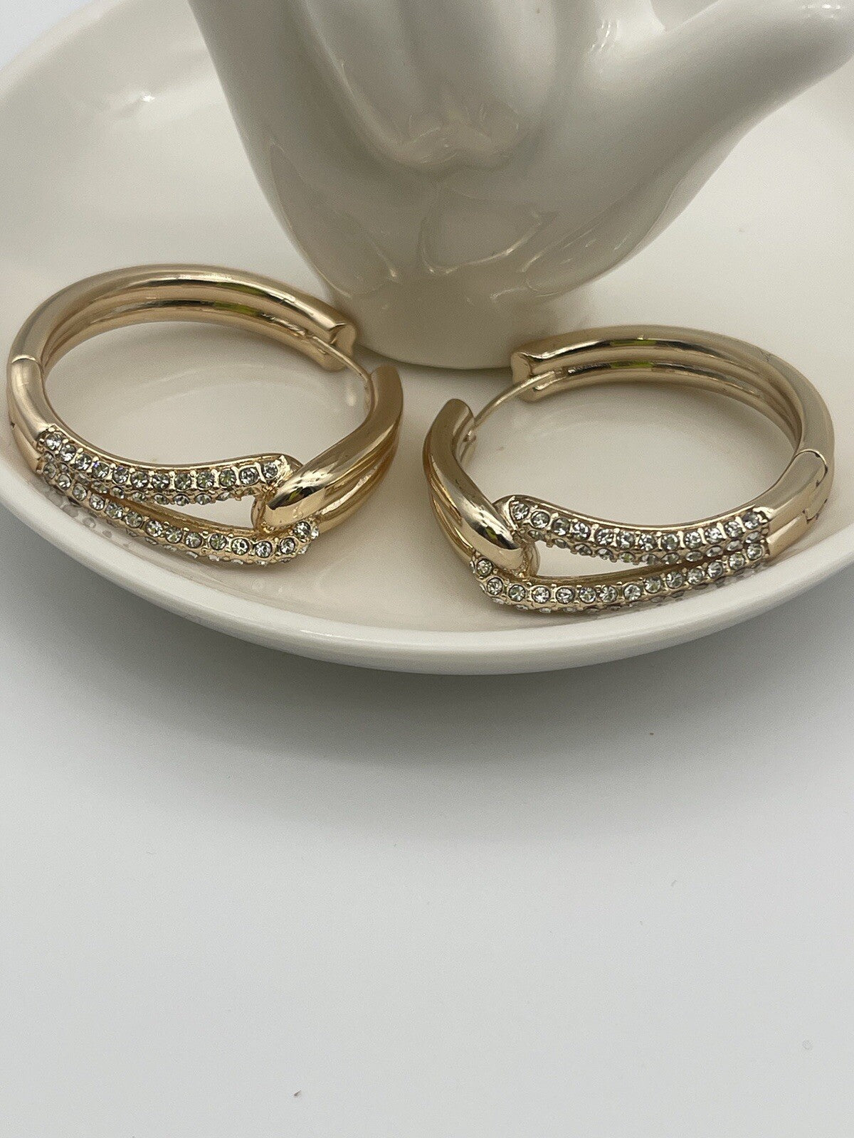 And Now This 18k gold over brass Crystal Knot Hoop Earrings 1 1/4"