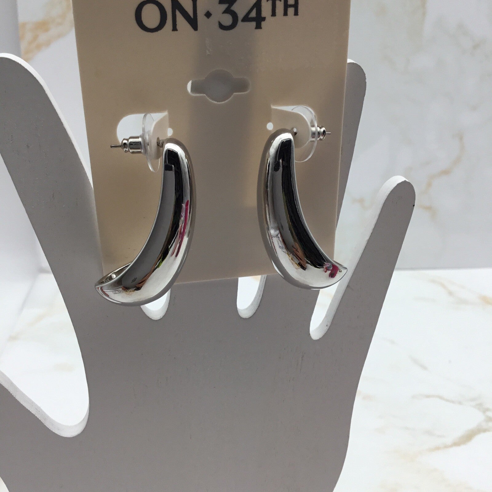 On 34th Medium Tapered Statement J-Hoop Earrings,  Silver Color 