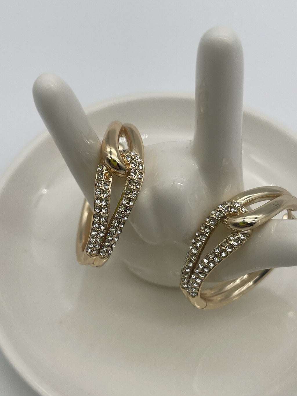 And Now This 18k gold over brass Crystal Knot Hoop Earrings 1 1/4"