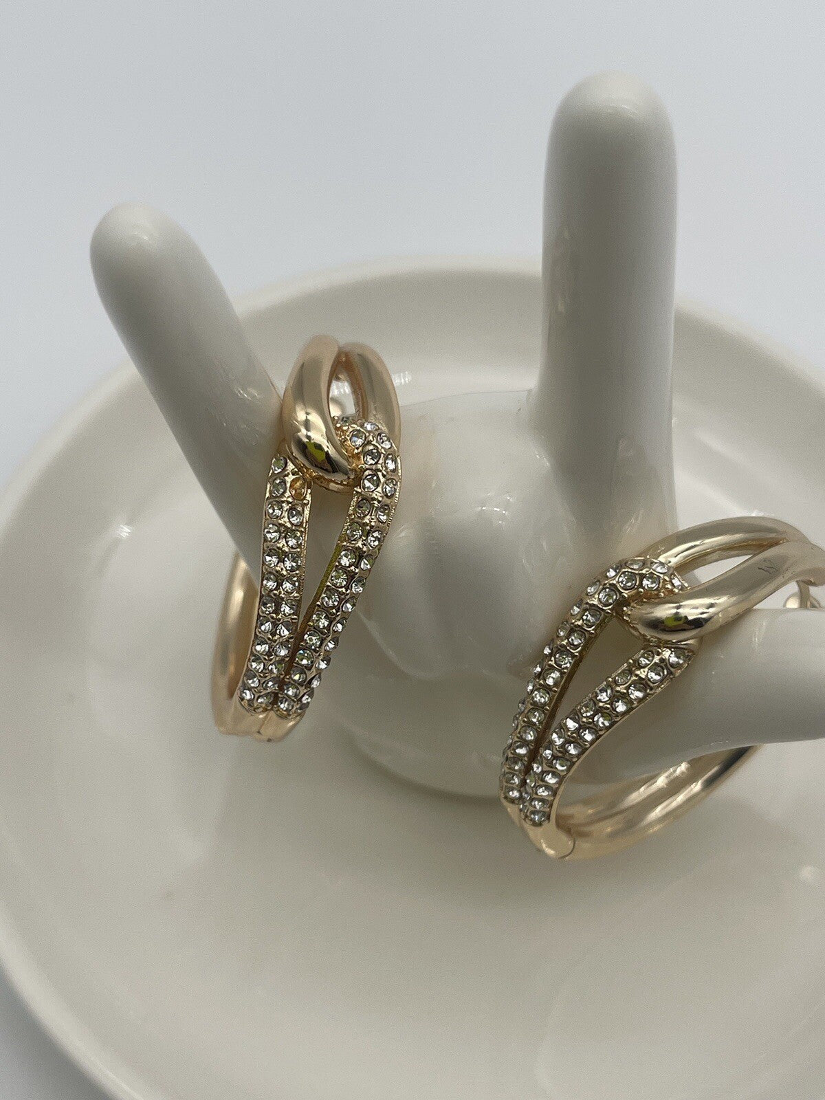 And Now This 18k gold over brass Crystal Knot Hoop Earrings 1 1/4"