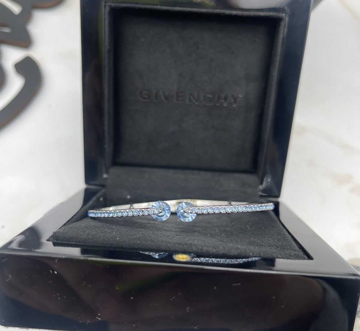 GIVENCHY SILVER TONE BLUE CRYSTALS BANGLE BRACELET 