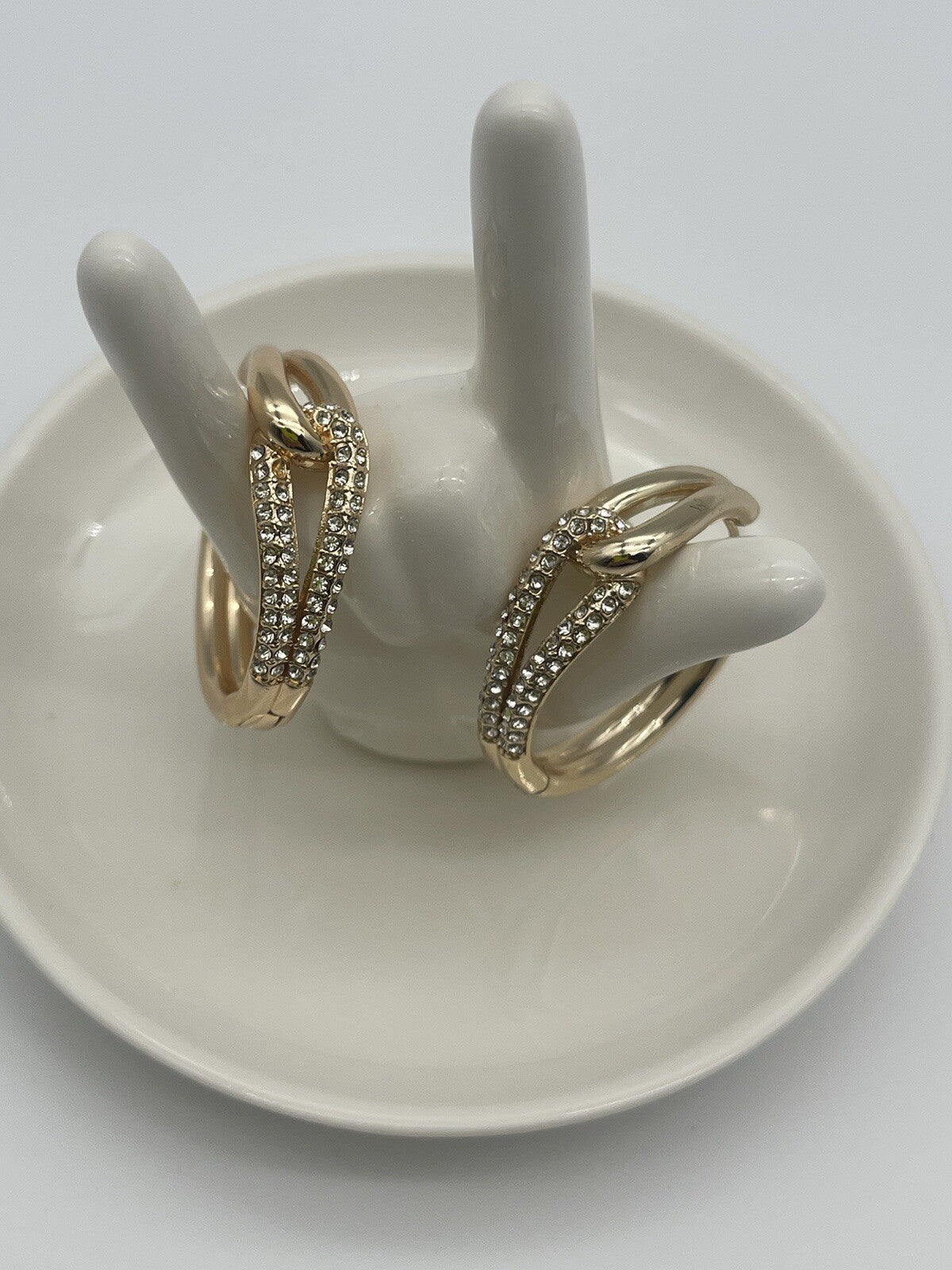 And Now This 18k gold over brass Crystal Knot Hoop Earrings 1 1/4"