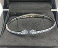 GIVENCHY SILVER TONE BLUE CRYSTALS BANGLE BRACELET 